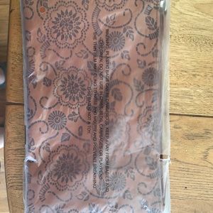 Small brown cosmetic bag